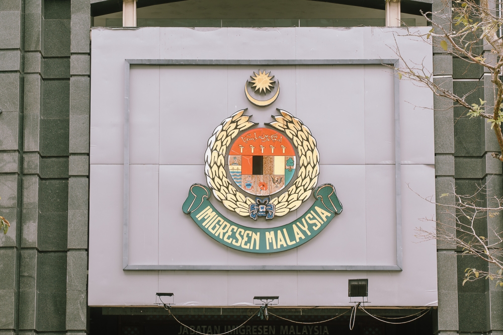 Immigration authorities dismantle major passport forgery network in Kuala Lumpur, detain three Indonesian nationals