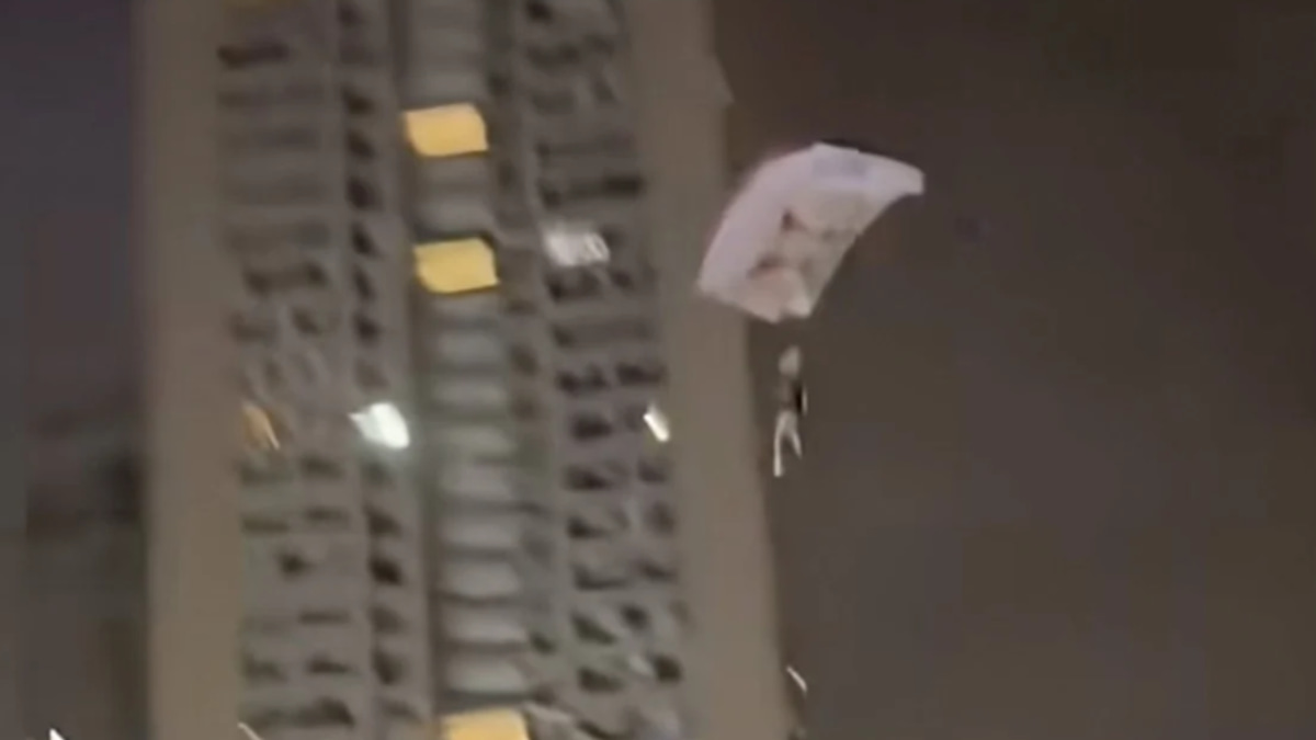 Chinese Man Detained After Stunt Parachute Jump From Residential Tower