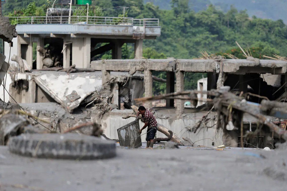 Nepal and China brace for secondary flooding threat as glacier-collapse lakes risk catastrophic bursts