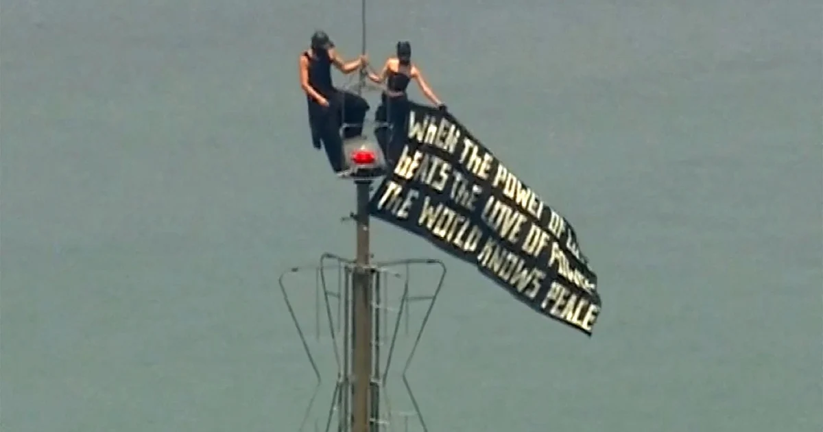 Two arrested after scaling Empire State Building antenna in daring rooftop proposal