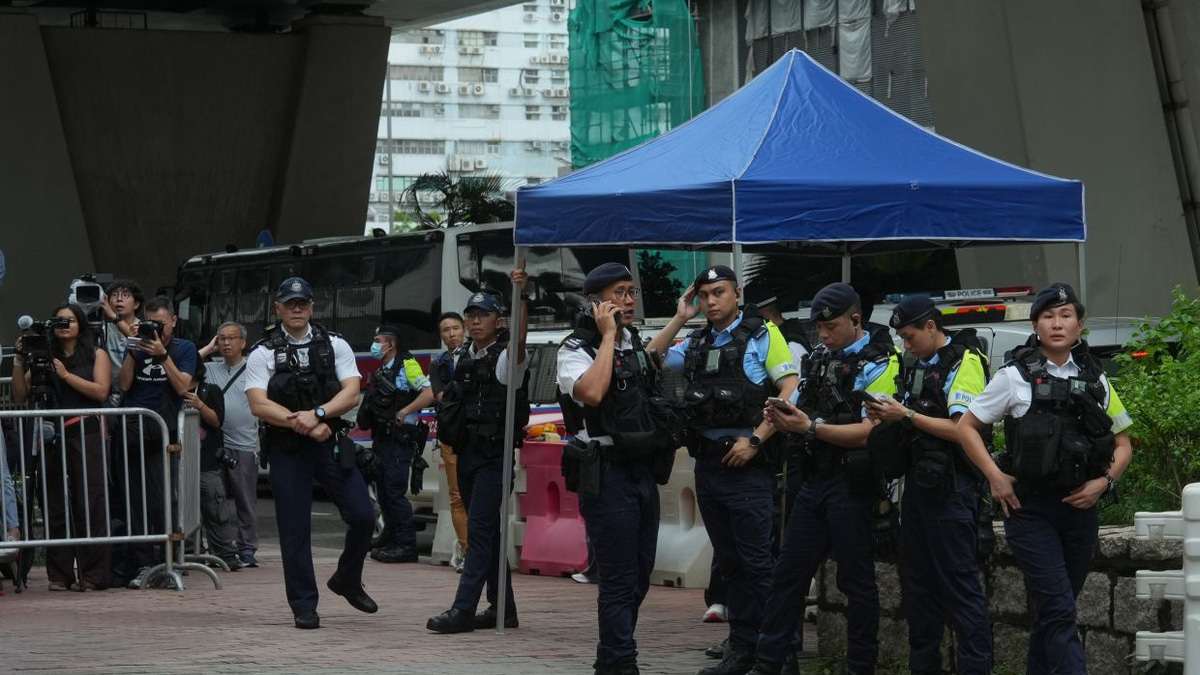Hong Kong woman arrested for seditious T-shirt as courts tighten grip on dissent