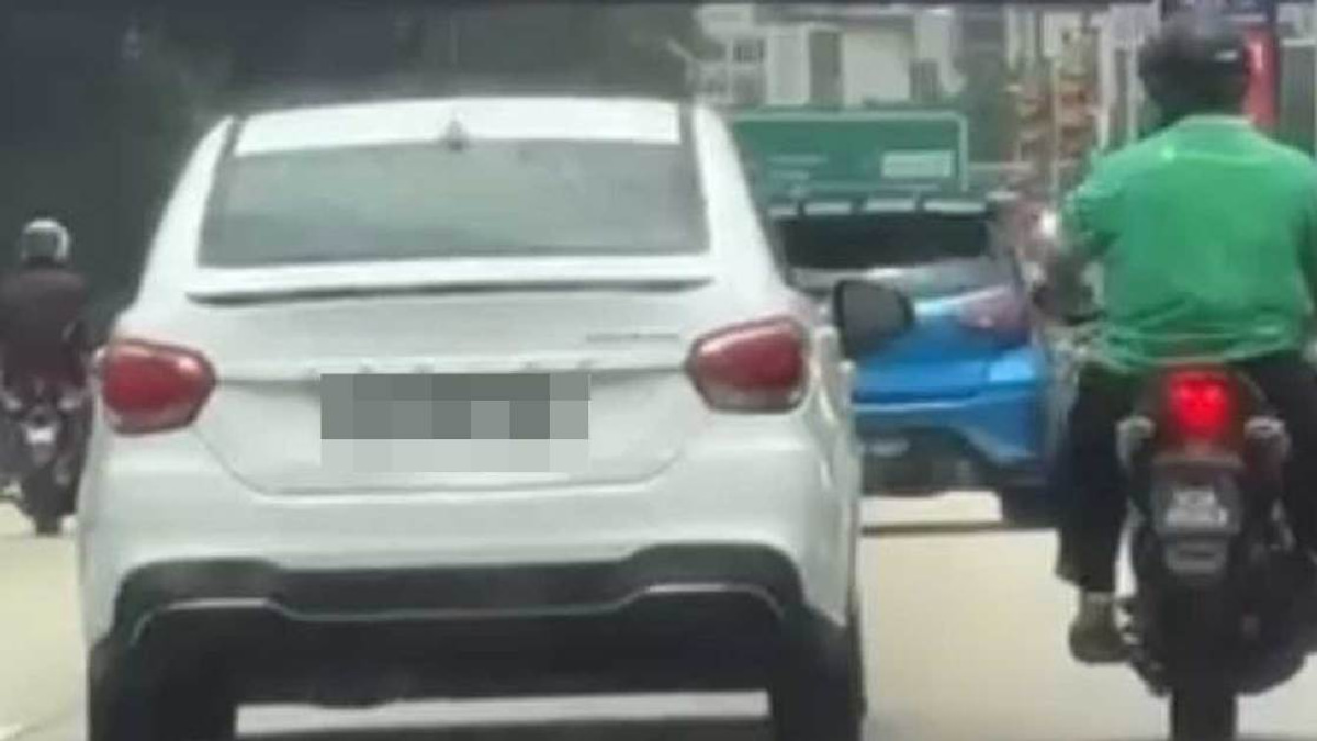 Man detained after hurling stone at car during highway confrontation