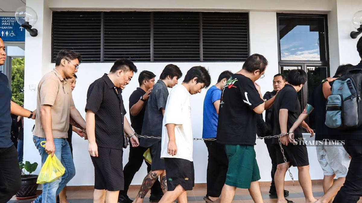 Nine Chinese nationals charged over alleged Romance scam operation in Penang