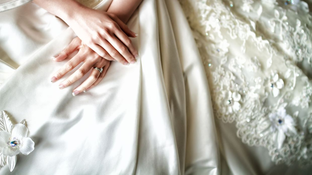 The Emotional Weight of Letting Go: Why Wedding Dresses Hold Such Powerful Meaning