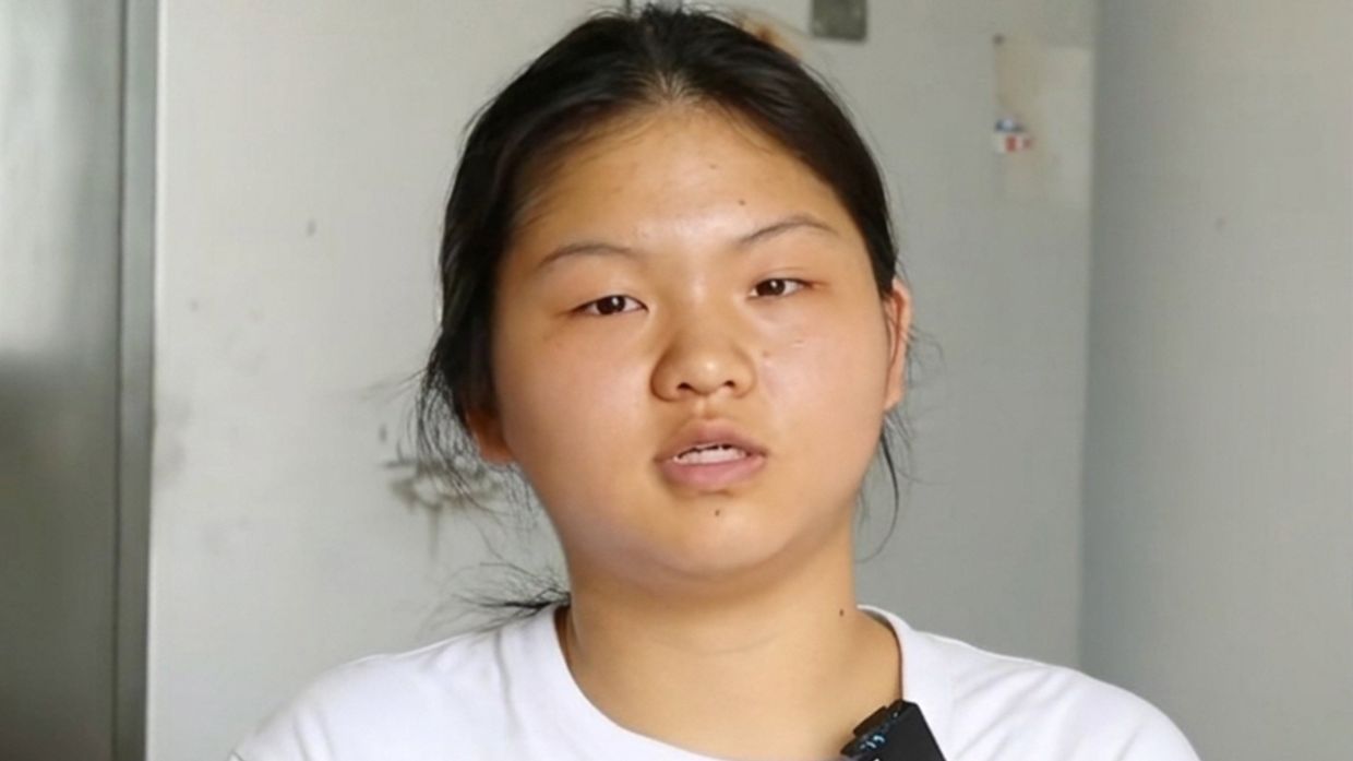 Chinese student's resilience shines as she declines aid after losing last relative