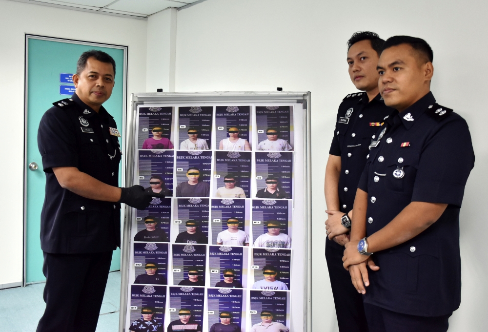 Police Dismantle Elaborate Investment Fraud Ring, Arrest 21 Chinese Nationals in Melaka