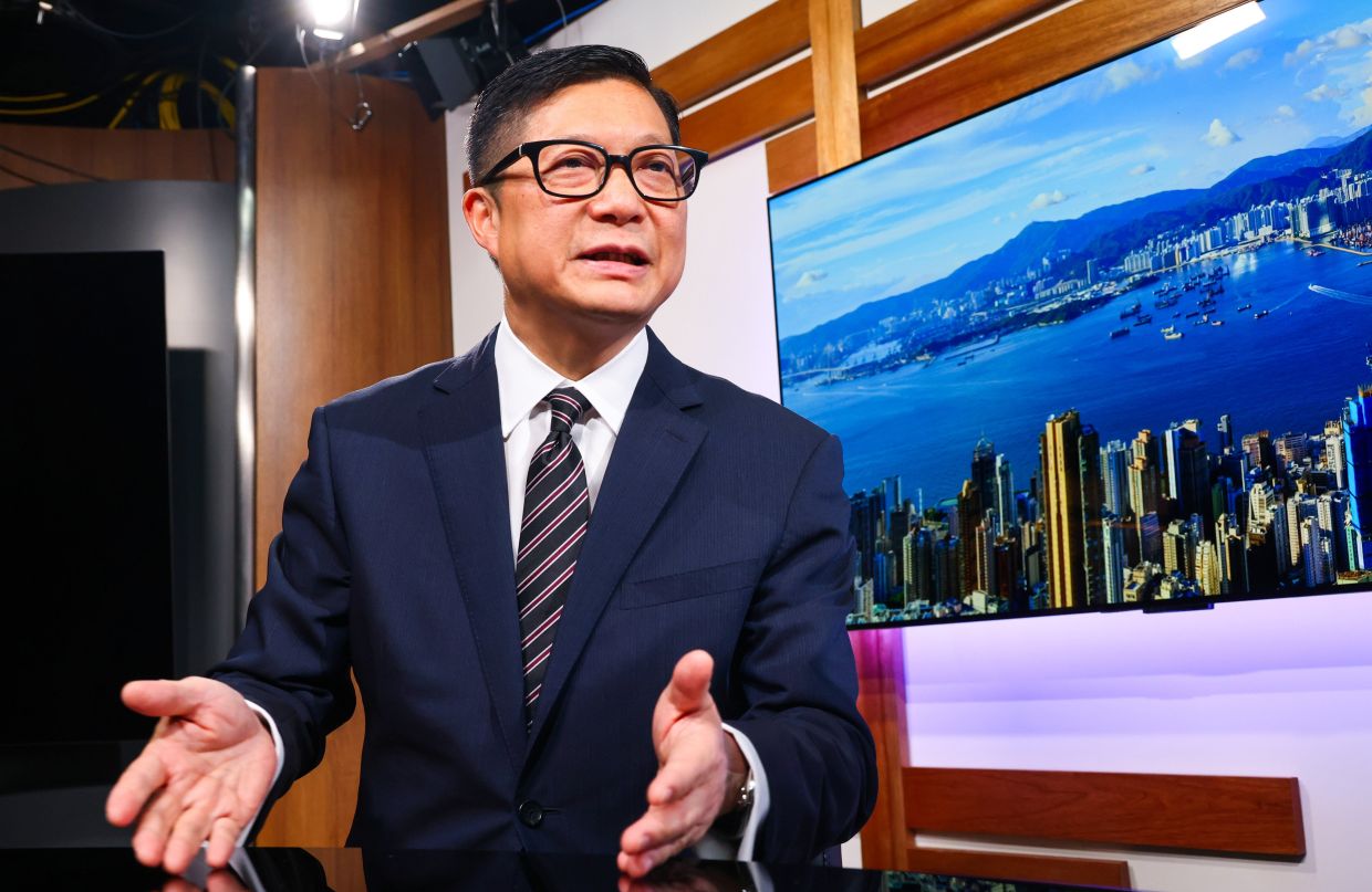 Hong Kong Security Chief Vows Accountability for Tai Po Fire, Dismisses Witness Compulsion Concerns