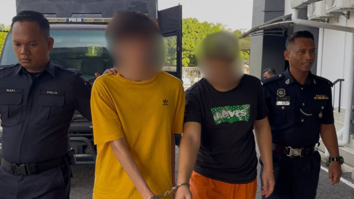 Two arrested in murder of man found trussed in net at Parit Raja
