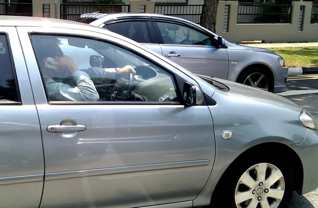 Singapore Tightens Traffic Laws with Phone-Holding Ban and Harsher Penalties for Reckless Driving