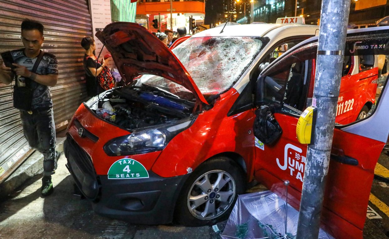Hong Kong Woman Seeks HK$8.4m Damages After Taxi Struck Her During 2019 Protest