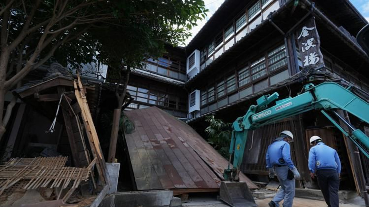 Japan's Kumamoto struggles with dual crisis as heat claims another life in quake aftermath